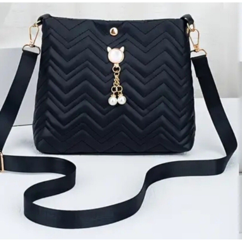 Black sleek crossbody‎ purse with cat and pearl latch Crossbody  bag